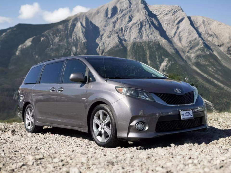 2012 Toyota Sienna for sale at Best Buy Motors in Signal Hill, CA