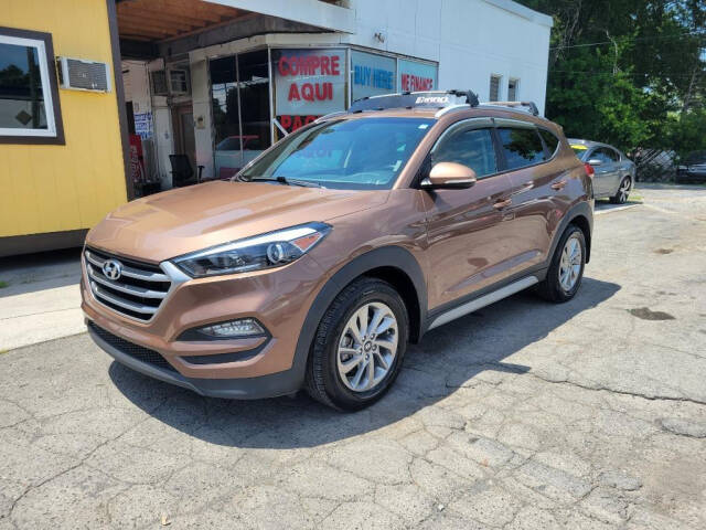 2017 Hyundai TUCSON for sale at DAGO'S AUTO SALES LLC in Dalton, GA