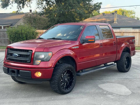 2013 Ford F-150 for sale at KM Motors LLC in Houston TX