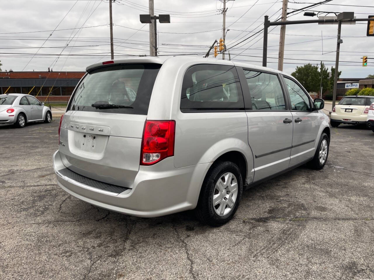 2012 Dodge Grand Caravan for sale at AVS AUTO GROUP LLC in CLEVELAND, OH