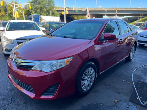 2014 Toyota Camry for sale at Goodfellas auto sales LLC in Clifton NJ