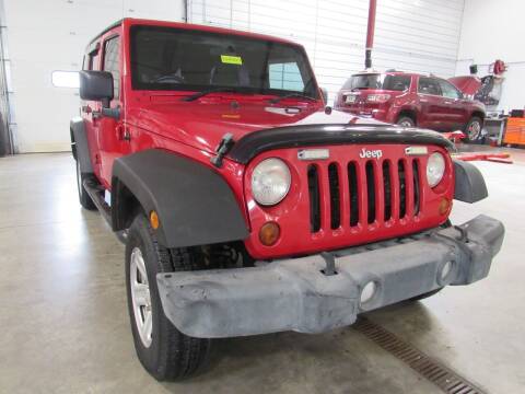 2012 Jeep Wrangler Unlimited for sale at Postal Pete in Galena IL