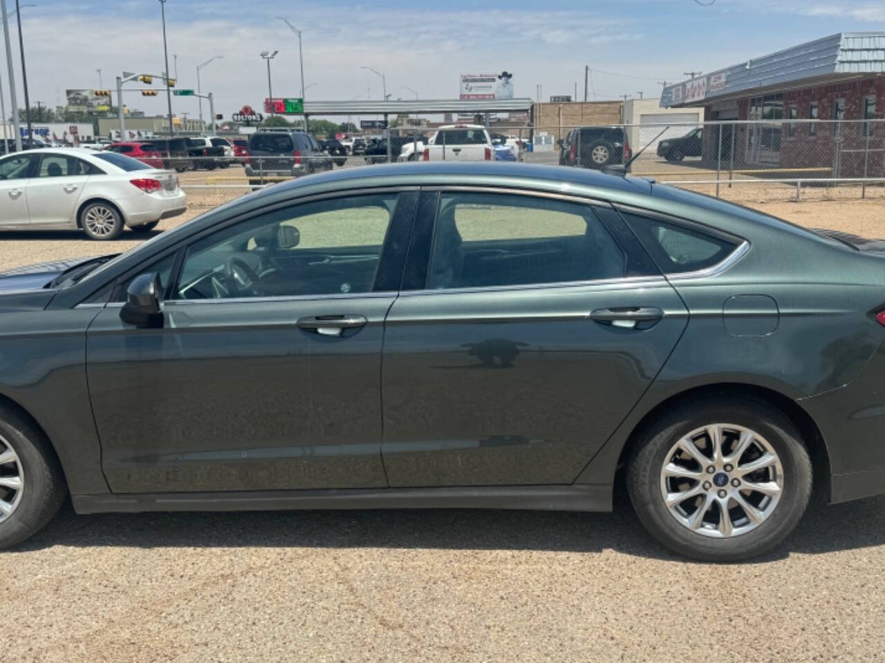 2015 Ford Fusion for sale at LEAF AUTO SALE LLC in Lubbock, TX