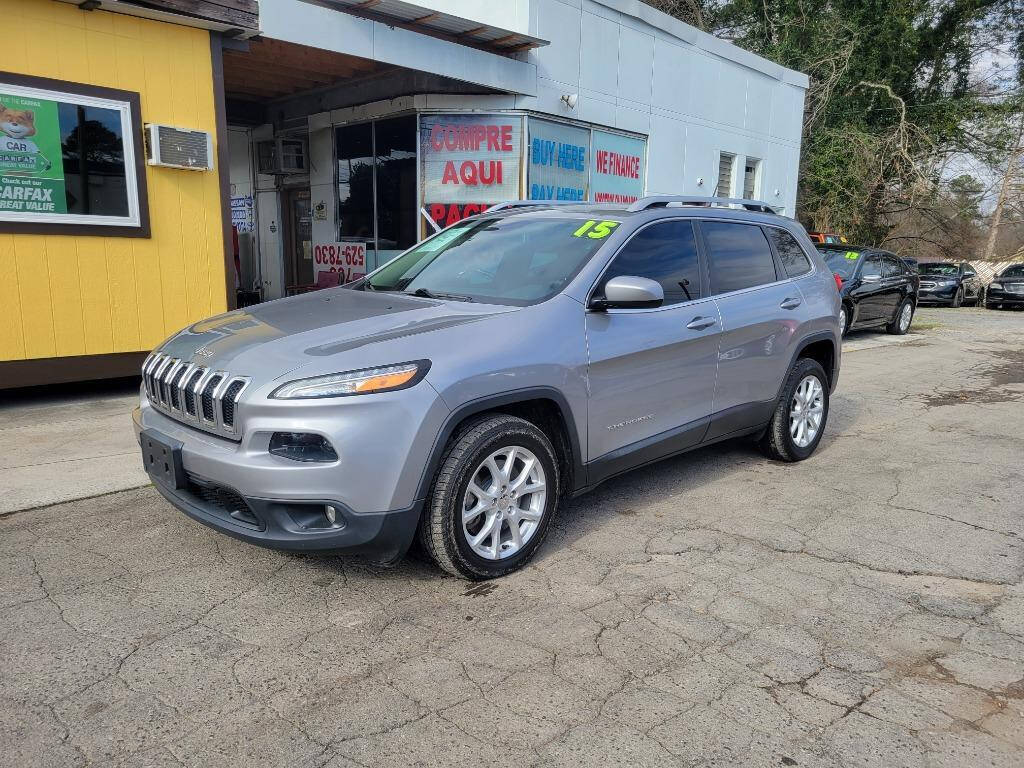 2015 Jeep Cherokee for sale at DAGO'S AUTO SALES LLC in Dalton, GA