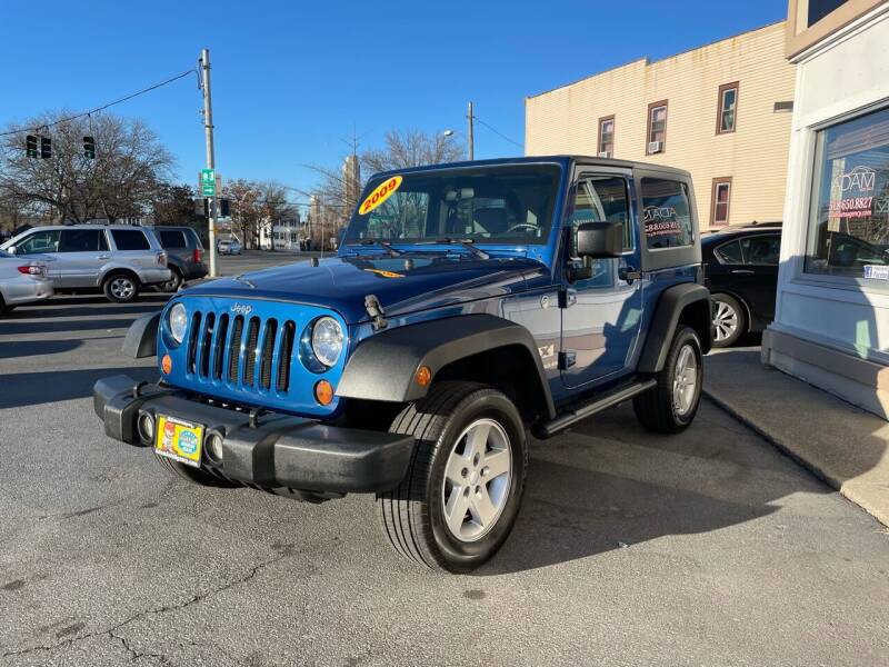 2009 Jeep Wrangler for sale at ADAM AUTO AGENCY in Rensselaer NY