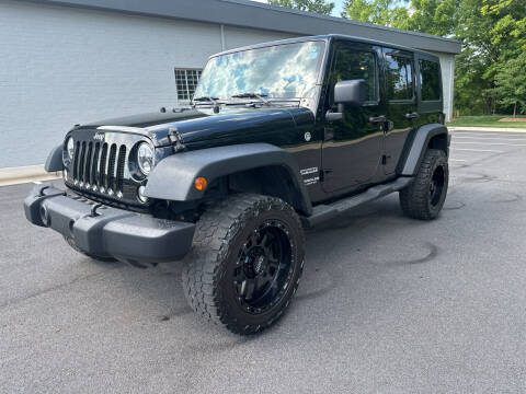 2014 Jeep Wrangler Unlimited for sale at Noble Auto in Hickory NC