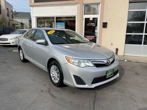 2014 Toyota Camry for sale at ADAM AUTO AGENCY in Rensselaer NY