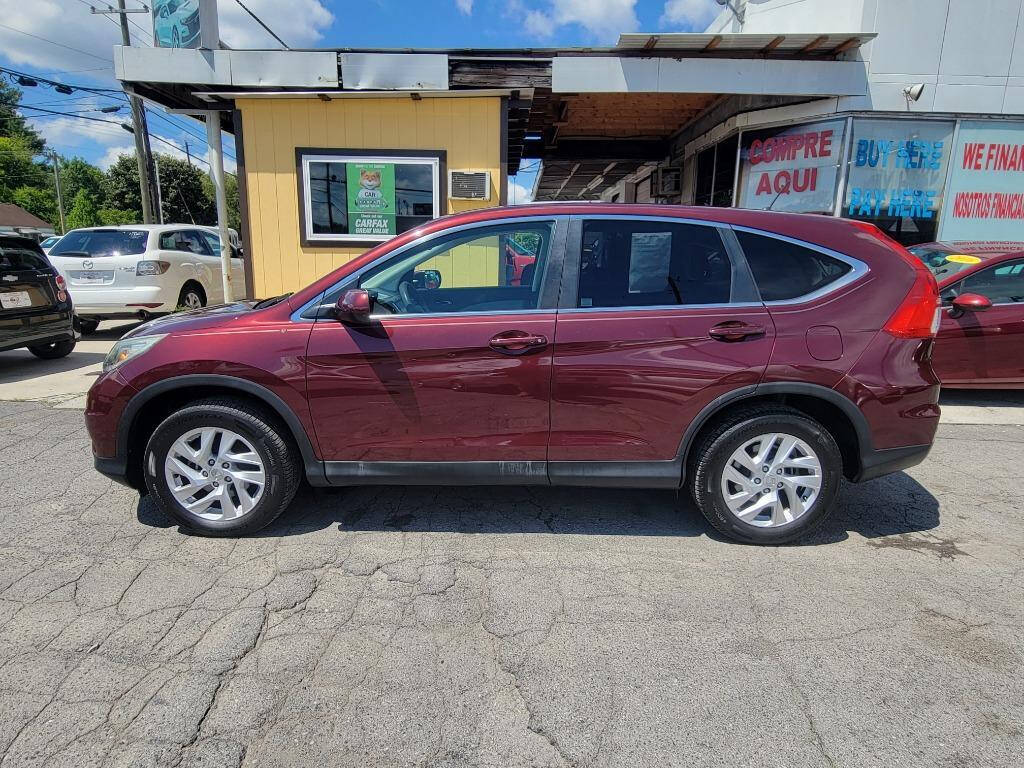 2016 Honda CR-V for sale at DAGO'S AUTO SALES LLC in Dalton, GA