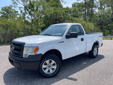 2014 Ford F-150 for sale at VICTORY LANE AUTO SALES in Port Richey FL