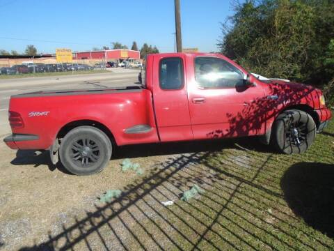 2003 Ford F-150 for sale at SCOTT HARRISON MOTOR CO in Houston TX