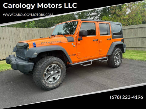 2013 Jeep Wrangler Unlimited for sale at Carology Motors LLC in Marietta GA
