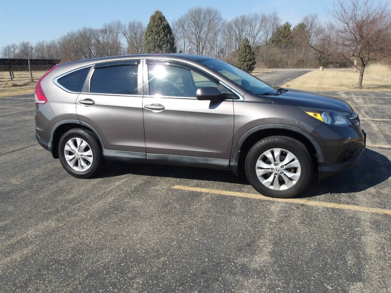 2014 Honda CR-V for sale at Crossroads Used Cars Inc. in Tremont IL
