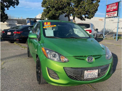 2012 Mazda MAZDA2 for sale at MERCED AUTO WORLD in Merced CA