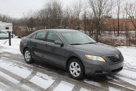 2009 Toyota Camry for sale at S & L Auto Sales in Grand Rapids MI