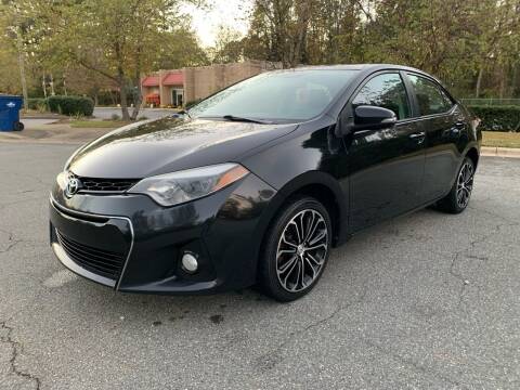 2014 Toyota Corolla for sale at Triangle Motors Inc in Raleigh NC