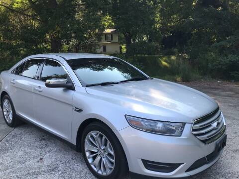 2013 Ford Taurus for sale at Empire Auto Group in Cartersville GA