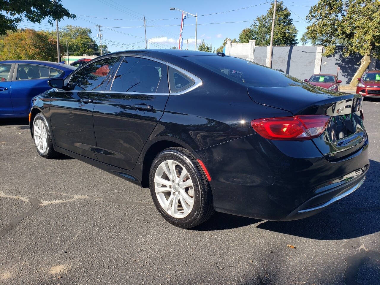 2015 Chrysler 200 for sale at Auto Shop in Wyoming, MI