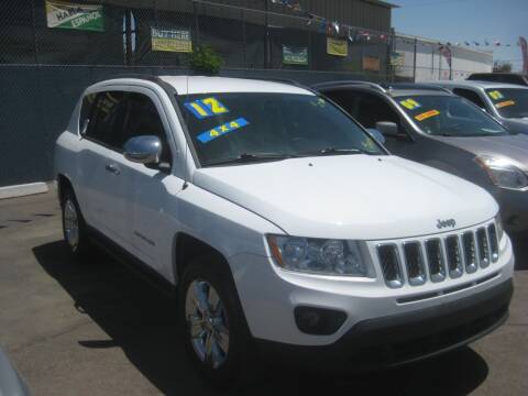 2012 Jeep Compass for sale at Town and Country Motors - 1702 East Van Buren Street in Phoenix AZ