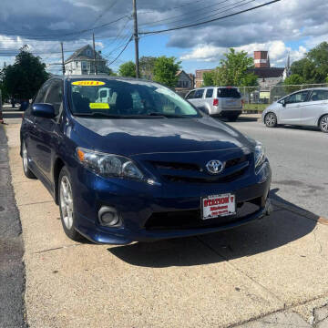 2011 Toyota Corolla for sale at A & J AUTO GROUP in New Bedford MA