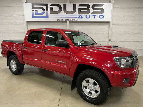 2015 Toyota Tacoma for sale at DUBS AUTO LLC in Clearfield UT