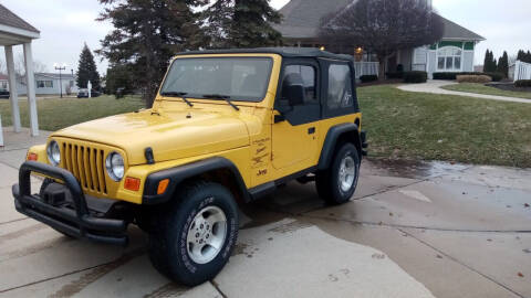 2000 Jeep Wrangler for sale at Heartbeat Used Cars & Trucks in Harrison Township MI