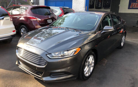 2015 Ford Fusion for sale at DEALS ON WHEELS in Newark NJ