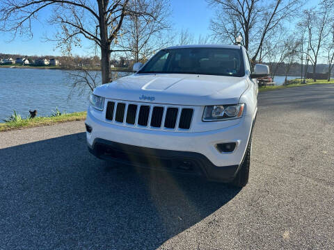 2014 Jeep Grand Cherokee for sale at PUTNAM AUTO SALES INC in Marietta OH