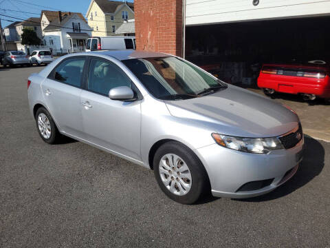 2012 Kia Forte for sale at A J Auto Sales in Fall River MA