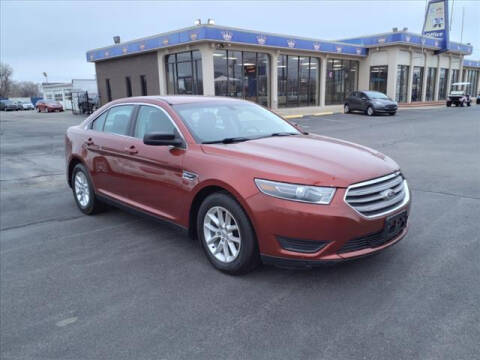 2014 Ford Taurus for sale at Credit King Auto Sales in Wichita KS