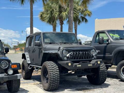 2011 Jeep Wrangler Unlimited for sale at Executive Motor Group in Leesburg FL