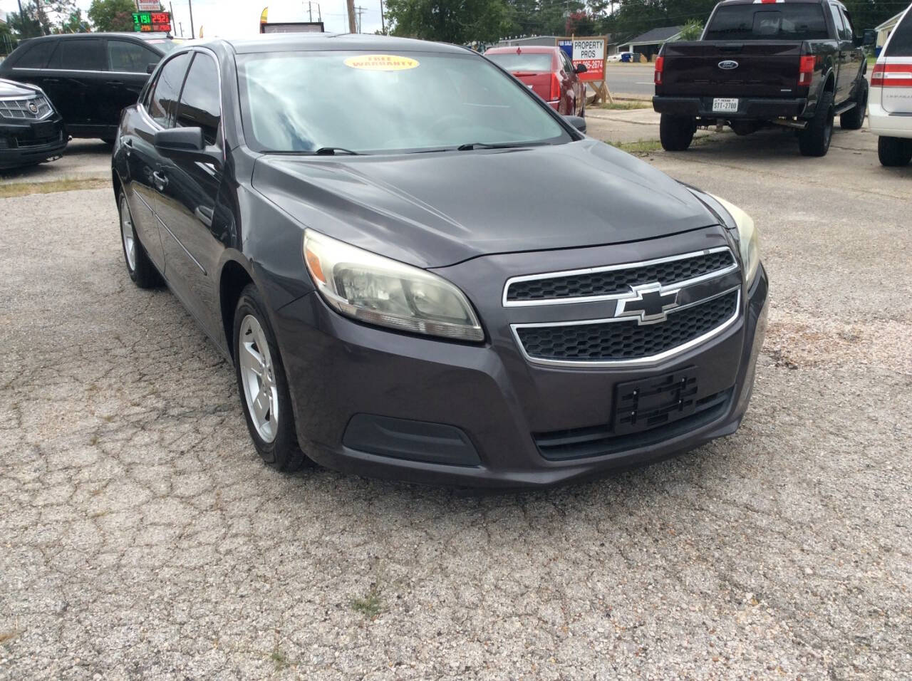 2013 Chevrolet Malibu for sale at SPRINGTIME MOTORS in Huntsville, TX