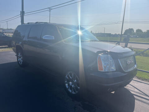 2011 GMC Yukon XL for sale at HEDGES USED CARS in Carleton MI