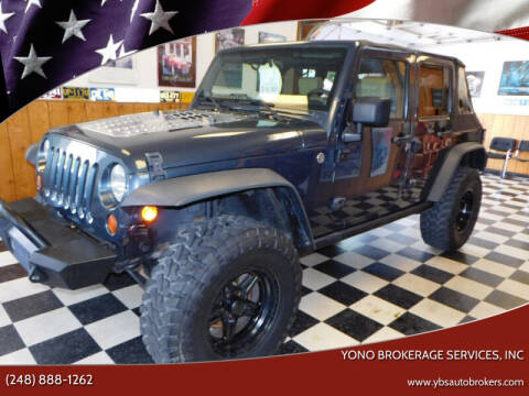 2008 Jeep Wrangler Unlimited for sale at Farmington's Finest Used Autos - Yono Brokerage Services, INC in Farmington MI