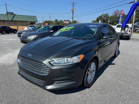 2015 Ford Fusion for sale at Cars for Less in Phenix City AL