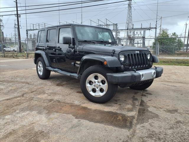 2014 Jeep Wrangler Unlimited for sale at FREDY KIA USED CARS in Houston TX