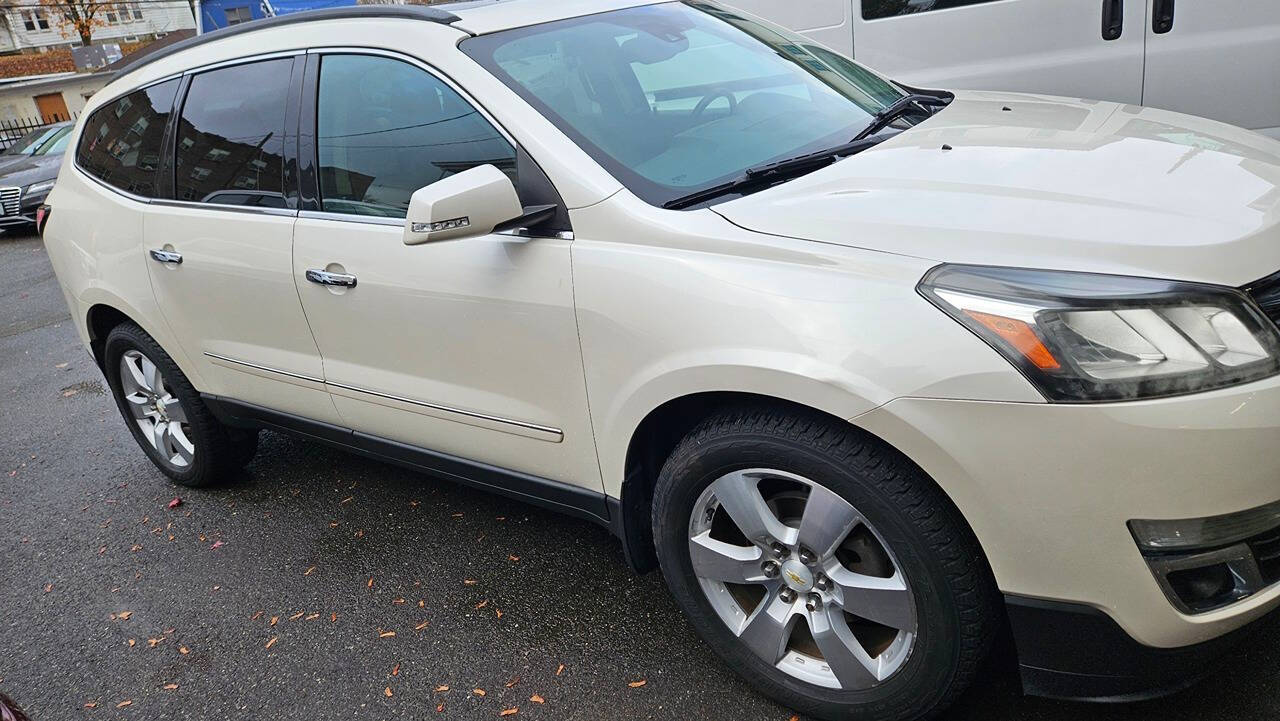 2014 Chevrolet Traverse for sale at RENOS AUTO SALES LLC in Waterbury, CT