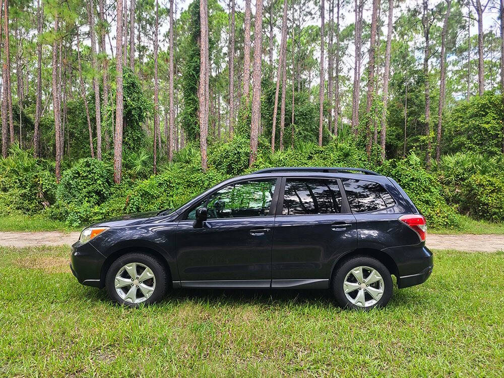 2014 Subaru Forester for sale at Flagler Auto Center in Bunnell, FL