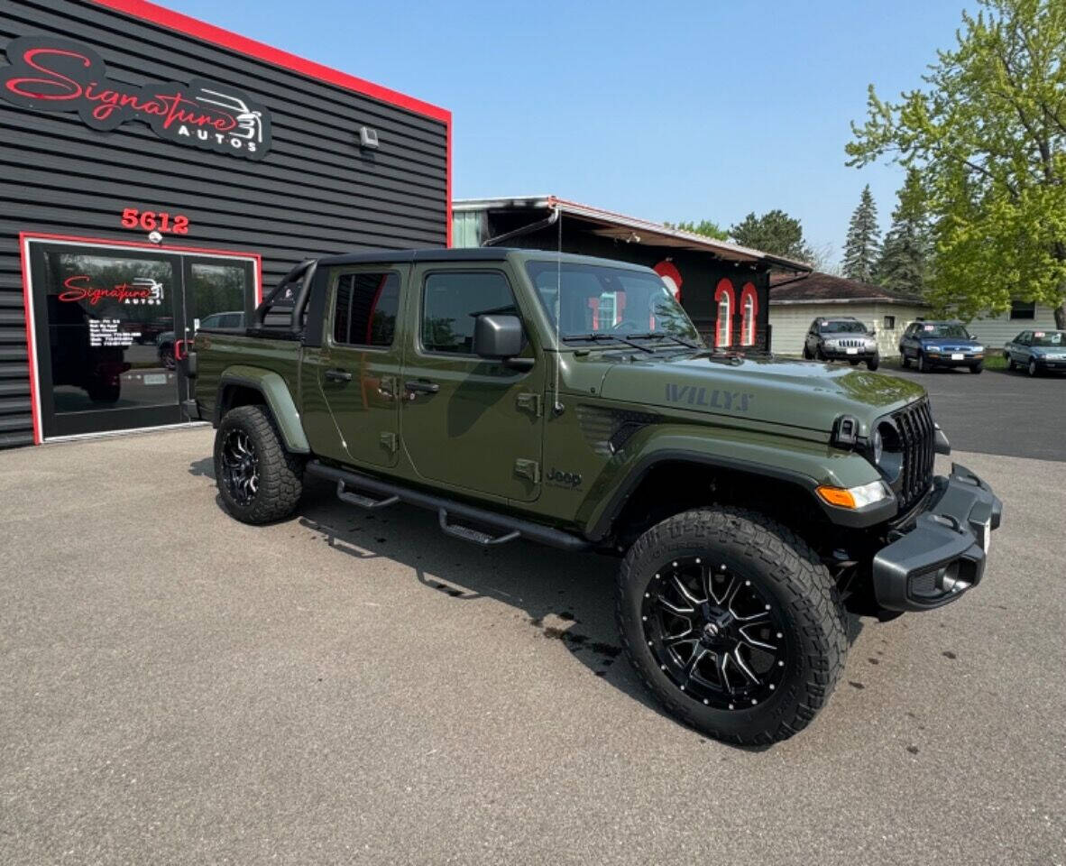 2022 Jeep Gladiator for sale at SIGNATURE AUTOS LLC in Weston, WI