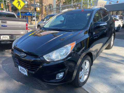 2013 Hyundai Tucson for sale at DEALS ON WHEELS in Newark NJ