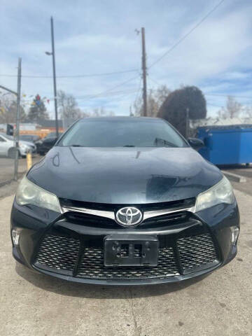 2015 Toyota Camry for sale at Queen Auto Sales in Denver CO