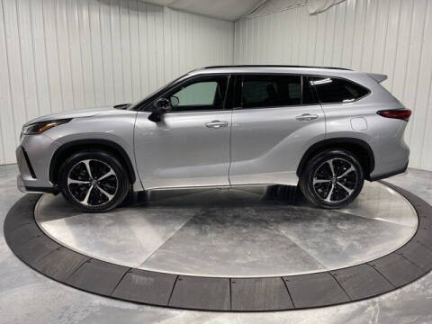 2021 Toyota Highlander for sale at HILAND TOYOTA in Moline IL