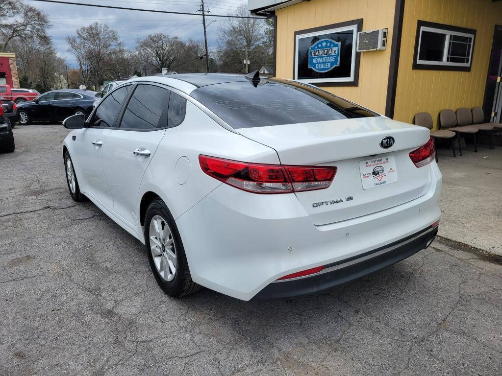 2016 Kia Optima for sale at DAGO'S AUTO SALES LLC in Dalton, GA