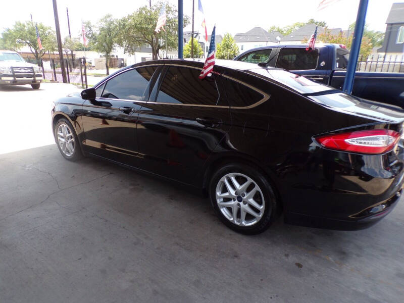 2014 Ford Fusion for sale at Under Priced Auto Sales in Houston TX