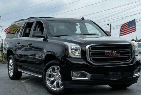 2015 GMC Yukon XL for sale at Atlanta Unique Auto Sales in Norcross GA