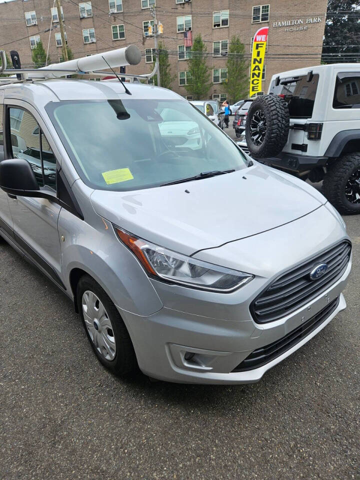 2019 Ford Transit Connect for sale at RENOS AUTO SALES LLC in Waterbury, CT