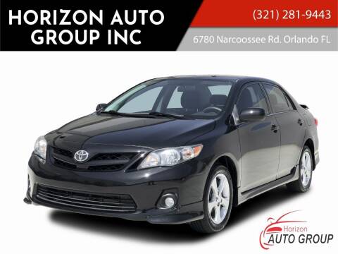 2013 Toyota Corolla for sale at HORIZON AUTO GROUP INC in Orlando FL