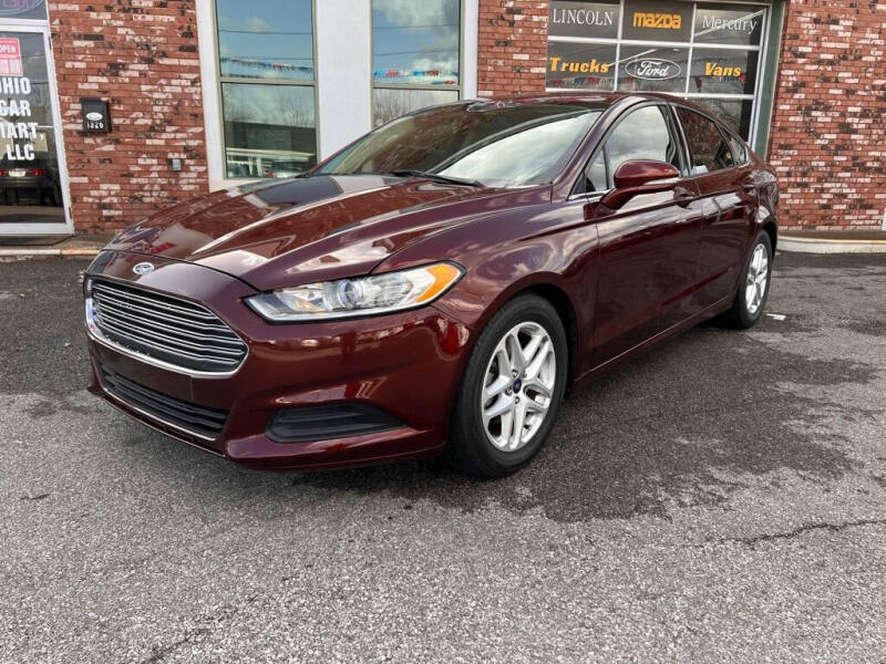 2015 Ford Fusion for sale at Ohio Car Mart in Elyria OH