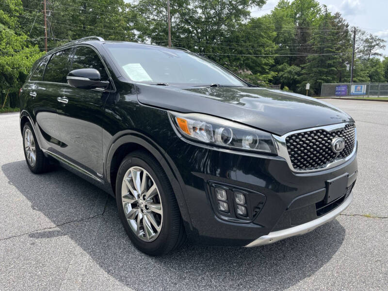 Used 2017 Kia Sorento SXL with VIN 5XYPKDA51HG187667 for sale in Roswell, GA