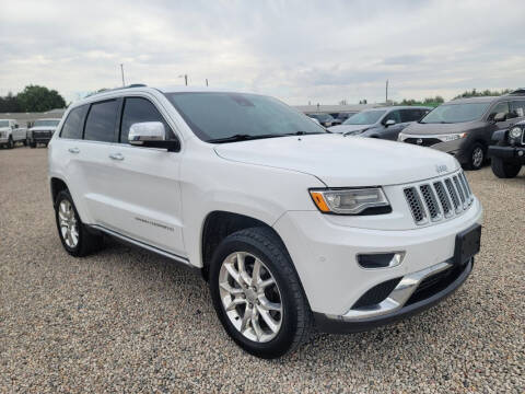 2015 Jeep Grand Cherokee for sale at BERKENKOTTER MOTORS in Brighton CO