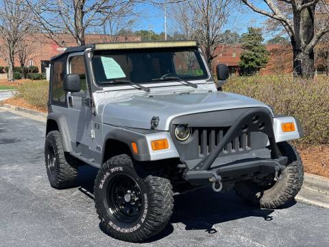 2004 Jeep Wrangler for sale at William D Auto Sales in Norcross GA